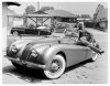 Mamie_Van_Doren_with_her_Jaguar_XK120__1954..jpg