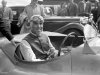 Italian motor racing star Tazio Nuvolari sits at the wheel of his Jaguar XK120.jpg